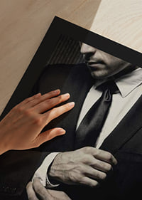 Close-up of man in black suit adjusting cufflinks-9