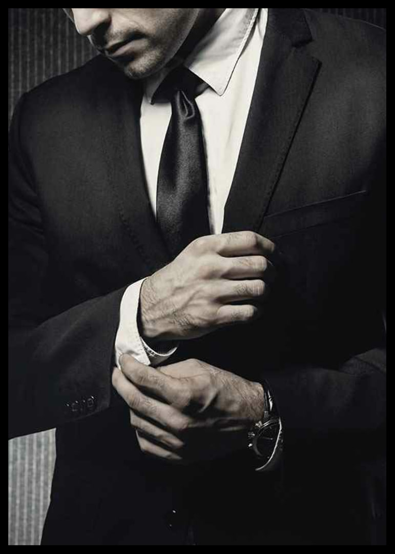 Close-up of man in black suit adjusting cufflinks-12