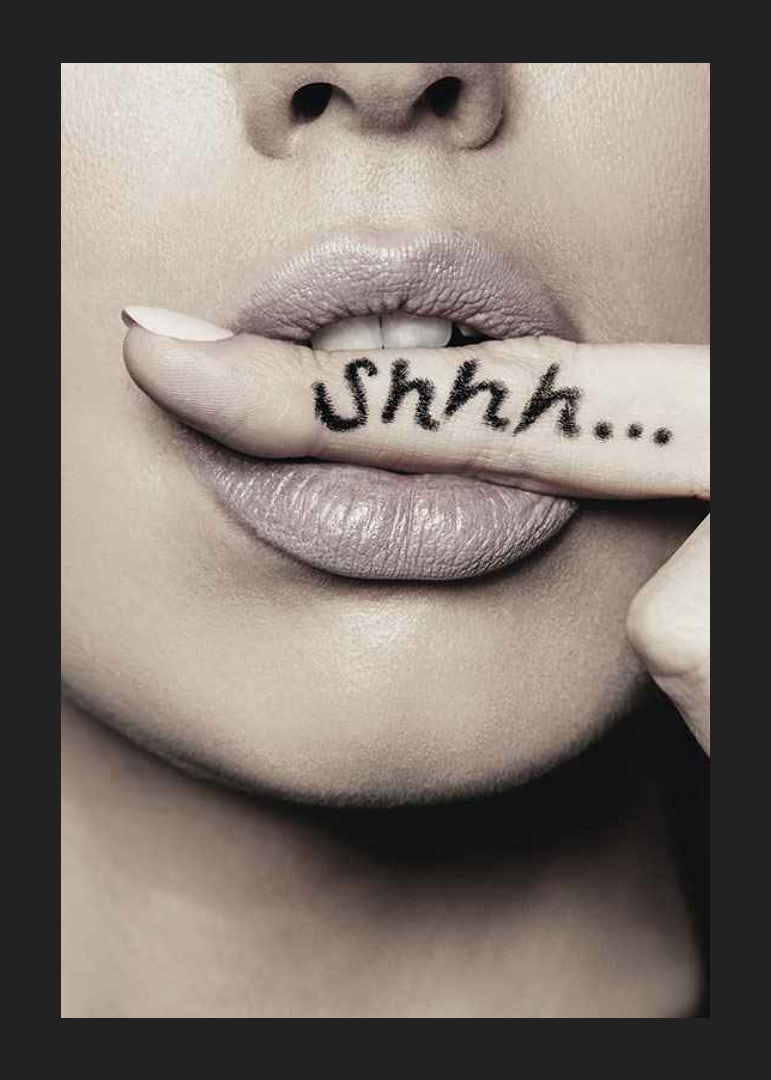 Close-up of woman's lips with finger in focus, text Shhh...-12