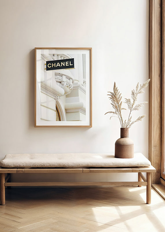 Photograph of Chanel sign against bright classic facade-12