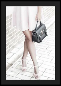 Photograph of woman in pink dress with black handbag-4