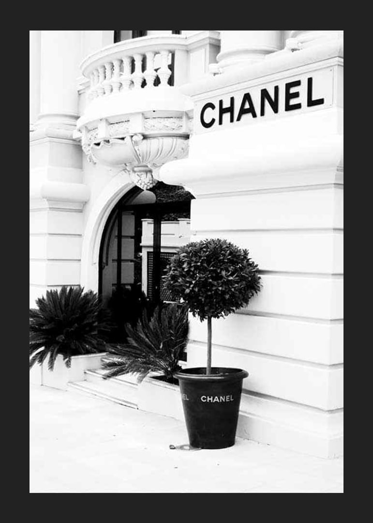 Black and white photo of the Chanel store entrance and facade-12