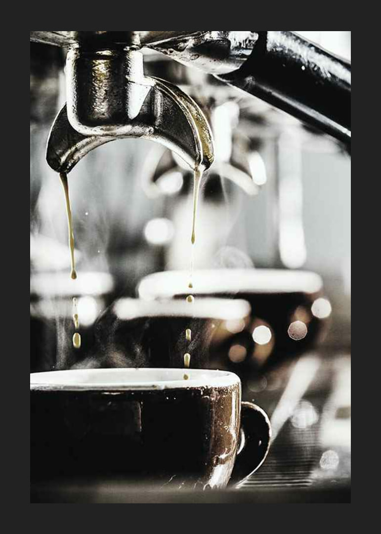 Close-up of coffee machine brewing coffee in dark cups-12