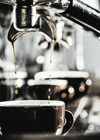 Close-up of coffee machine brewing coffee in dark cups-7