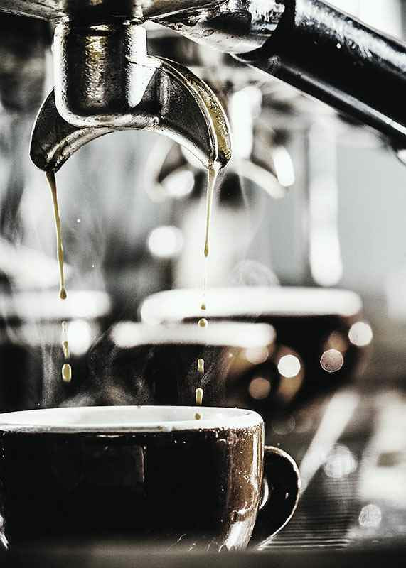 Close-up of coffee machine brewing coffee in dark cups-12