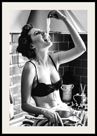 Black and white photo art with woman eating spaghetti in kitchen-2