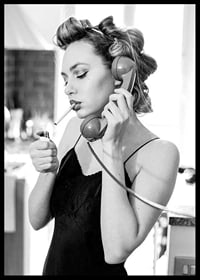 Black and white photo of woman with hair curlers, phone and cigarette-6