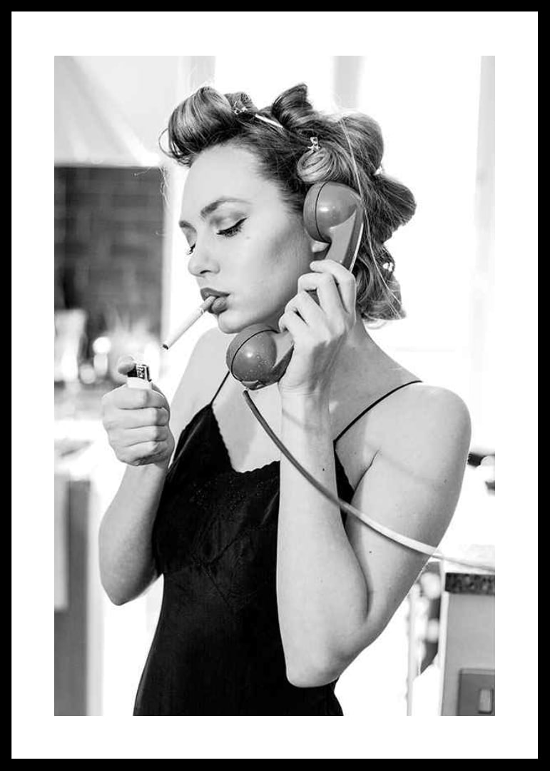 Black and white photo of woman with hair curlers, phone and cigarette-12