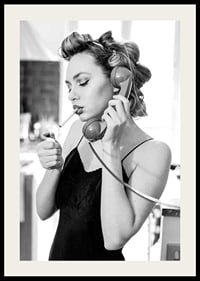 Black and white photo of woman with hair curlers, phone and cigarette-2