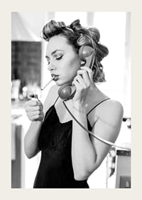 Black and white photo of woman with hair curlers, phone and cigarette-3