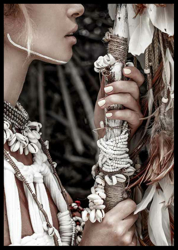 Close-up of woman with jewelry and shells in natural tones-12
