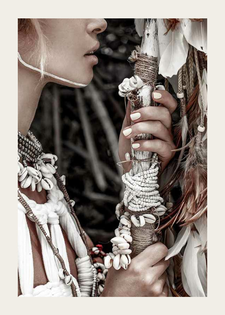 Close-up of woman with jewelry and shells in natural tones-12