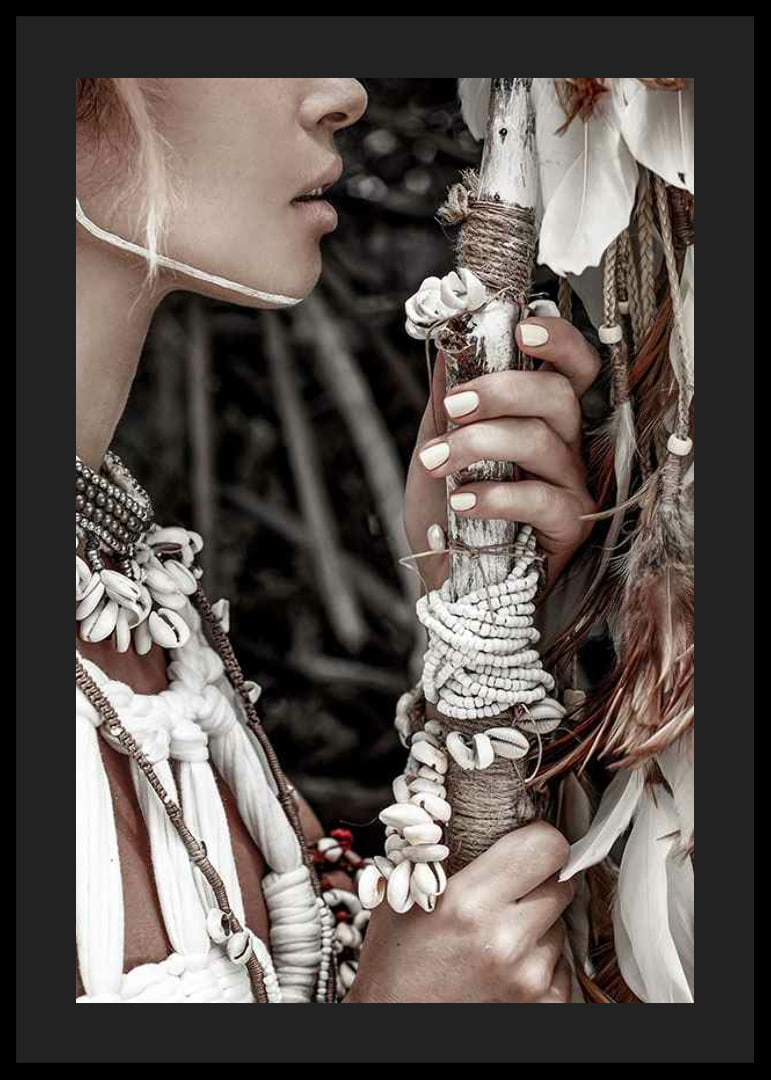 Close-up of woman with jewelry and shells in natural tones-12