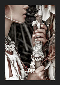 Close-up of woman with jewelry and shells in natural tones-5