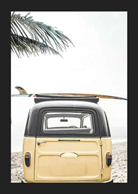 Yellow retro bus with surfboard on the roof at sandy beach-5