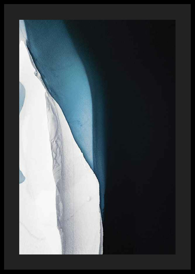 Photographic view from above of ice formation at dark water-12