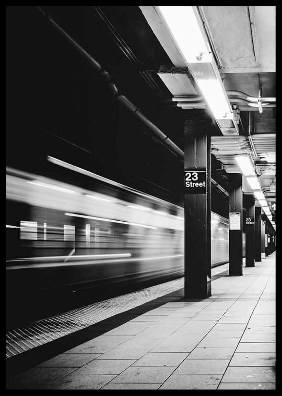 Black and white view of subway platform on 23rd Street in New York-12