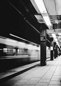 Black and white view of subway platform on 23rd Street in New York-7