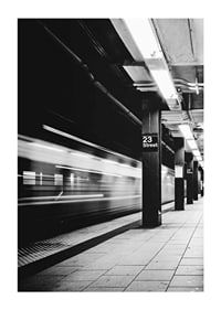 Black and white view of subway platform on 23rd Street in New York-1