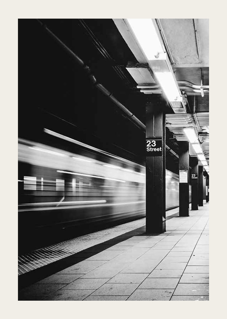 Black and white view of subway platform on 23rd Street in New York-12