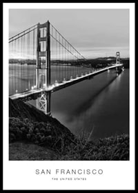 Black and white photograph of the Golden Gate Bridge over the water at dusk-0