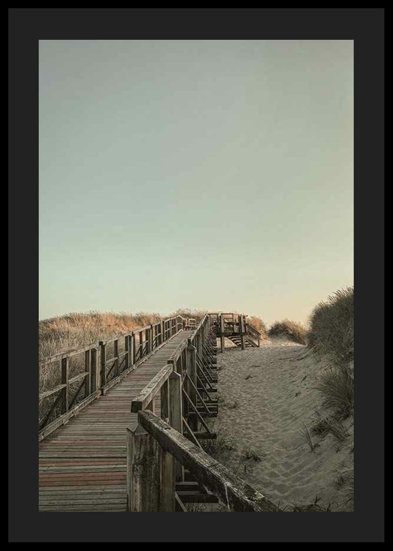 Photograph of wooden pier over sand dunes against bright sky-12