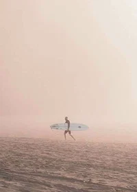 Photographic surfer with board on beach in fog, beige tones-7