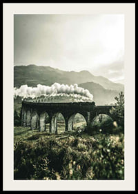 Photograph of train on Glenfinnan Viaduct in green valley-2