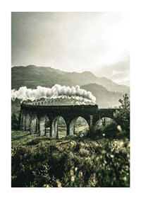 Photograph of train on Glenfinnan Viaduct in green valley-1