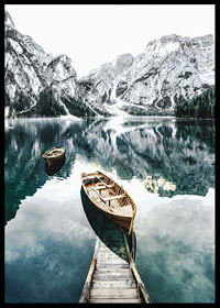 Photograph of rowboats on clear lake with snow-capped mountains-6
