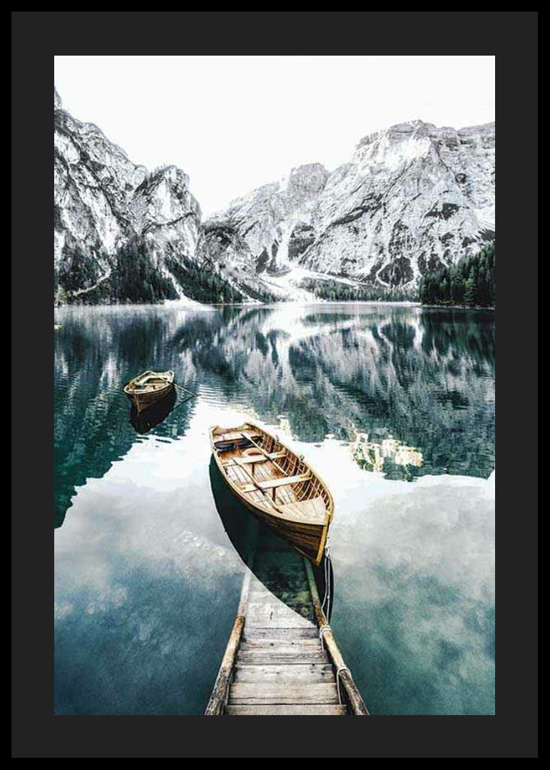 Photograph of rowboats on clear lake with snow-capped mountains-12