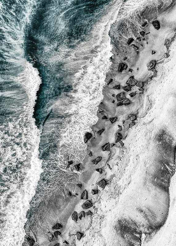 Bird's eye view of rocky beach with turquoise sea water-12