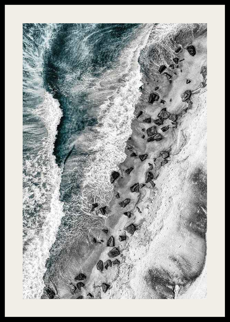 Bird's eye view of rocky beach with turquoise sea water-12