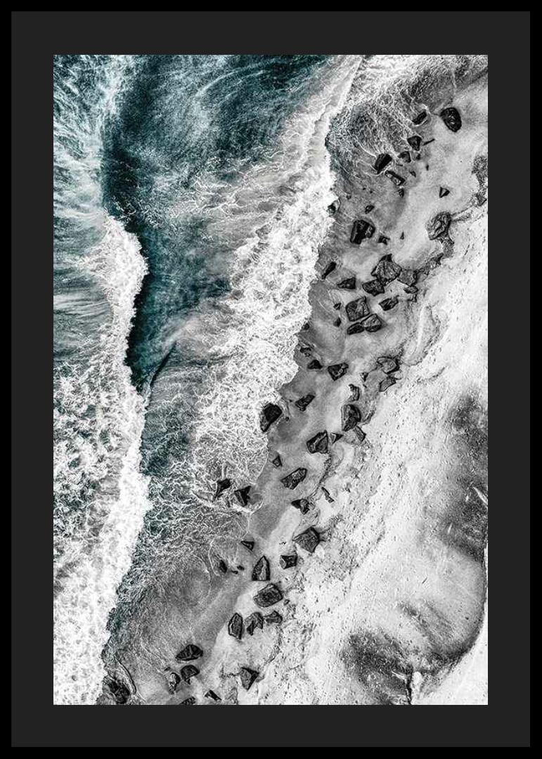 Bird's eye view of rocky beach with turquoise sea water-12