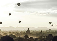 Photograph of hot air balloons over temples in Bagan, Myanmar-7