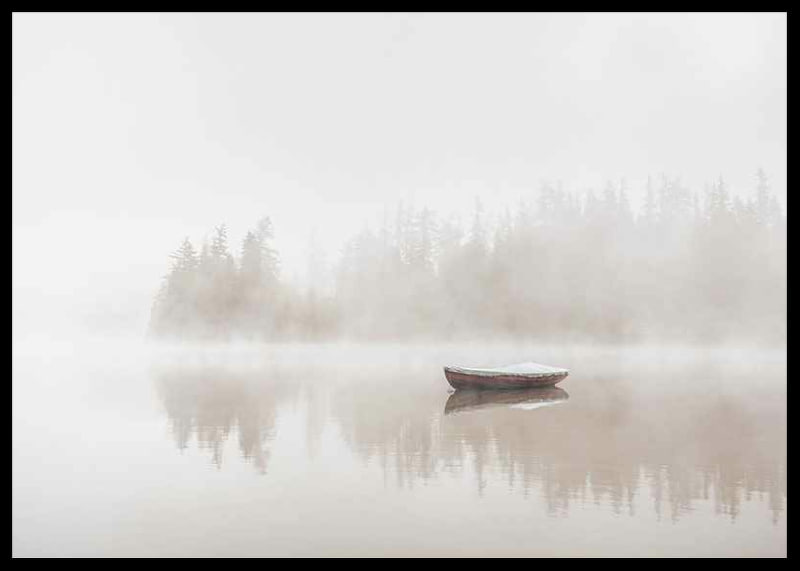 Red rowboat on calm lake with fog and forest in the background-12