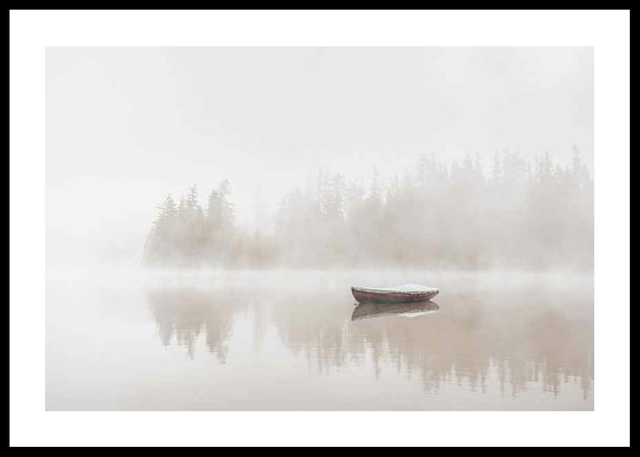 Red rowboat on calm lake with fog and forest in the background-12