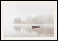 Red rowboat on calm lake with fog and forest in the background-2
