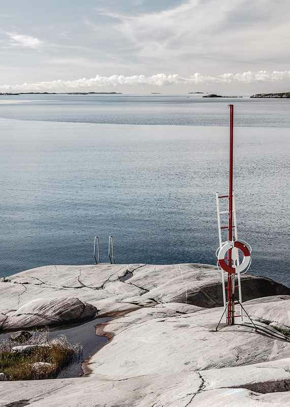 Photographic coastal landscape with cliffs and bathing ladder by the sea-12