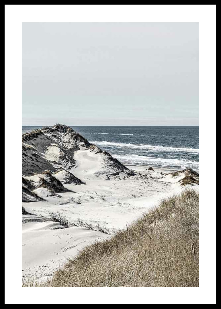 Photographic coastal landscape with sand dunes and sea in soft tones-12