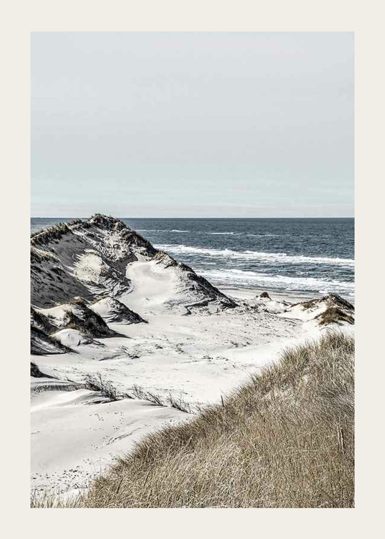 Photographic coastal landscape with sand dunes and sea in soft tones-12