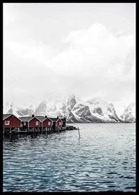 Photograph of red fishing huts by the water and snow-capped mountains-6