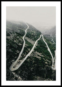 Aerial view of the winding road Trollstigen in a foggy mountain landscape-0