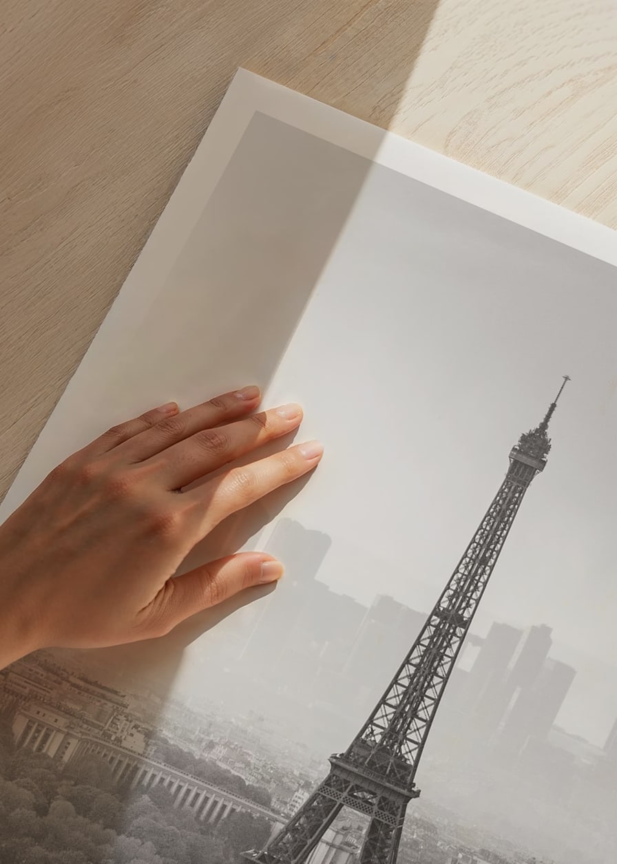 Black and white photograph of the Eiffel Tower with Paris cityscape-12