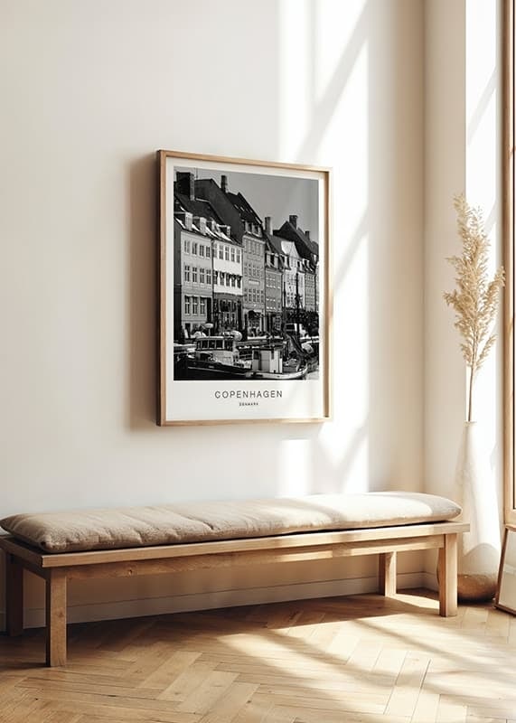 Black and white photo of Nyhavn facades and boats in Copenhagen-12