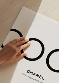 Minimalist text design with black COCO and Chanel quote-3