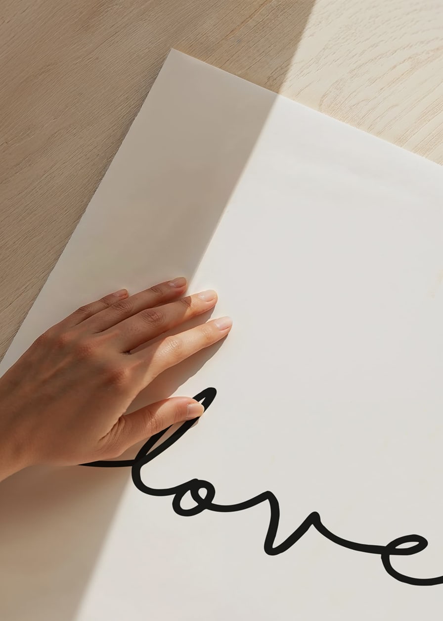 Simple line drawing of the word love in black against white background-12