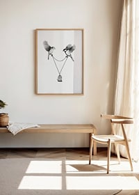 Två svartvita mesar bär en tom bur i kedja, Sanna Wieslander-2