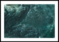 Aerial view of turquoise sea with white wave patterns and foam-0