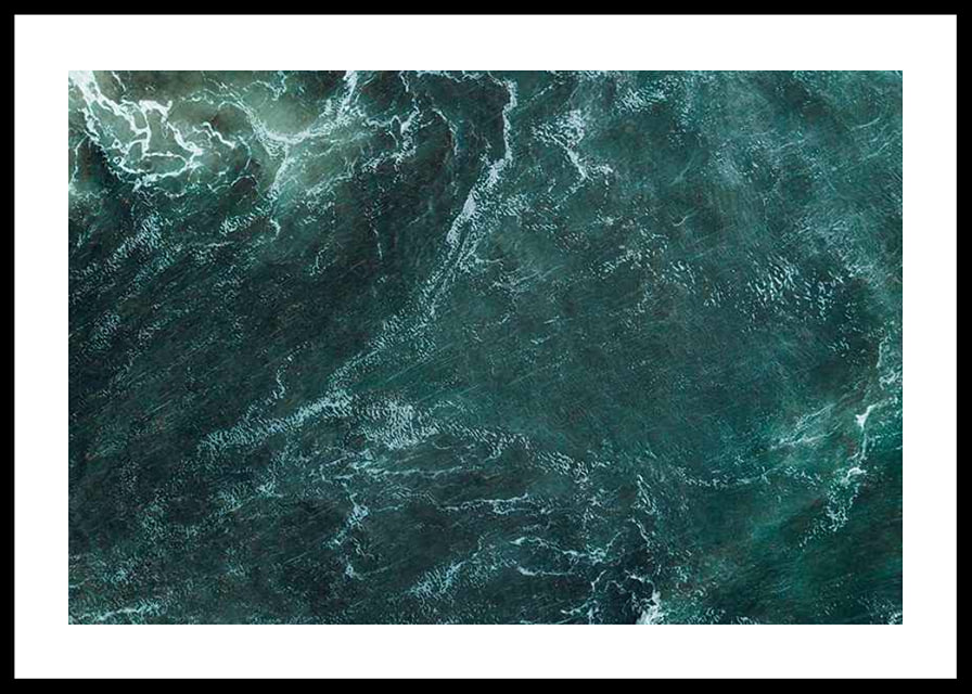 Aerial view of turquoise sea with white wave patterns and foam-12